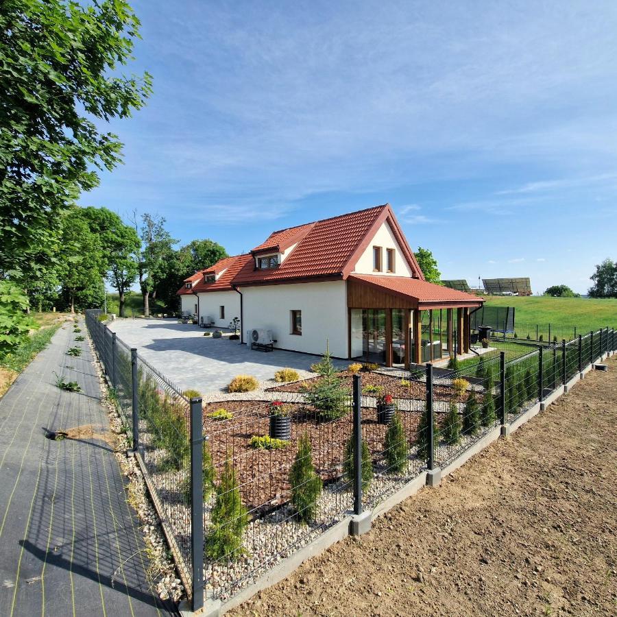 Markowe Domki Ryn  Exterior photo